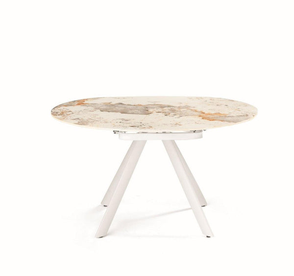 Tavolo Round allungabile 135 x 87 cm. in pietra effetto marmo con piano girevole che si trasforma in rotondo Ø 135 cm. Ikone Casa
