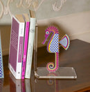 reggilibro con decoro cavalluccio marino foto espositiva