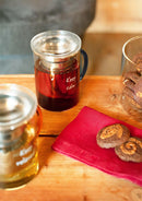 Tisaniera in vetro borosilicato con manico colorato e scritta WD Lifestyle